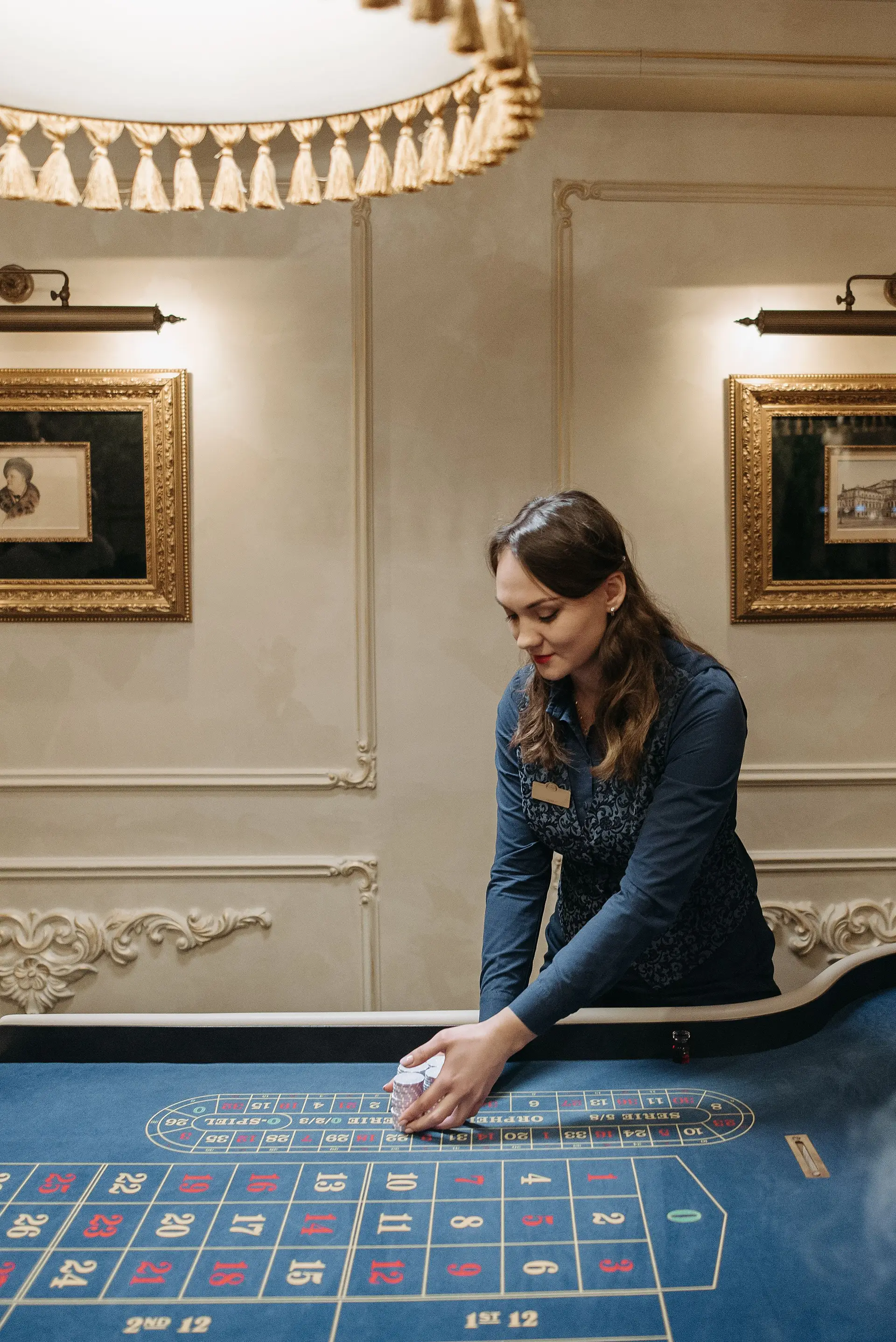 Professional dealer at the roulette table